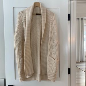Cream coloured cable knit cardigan
